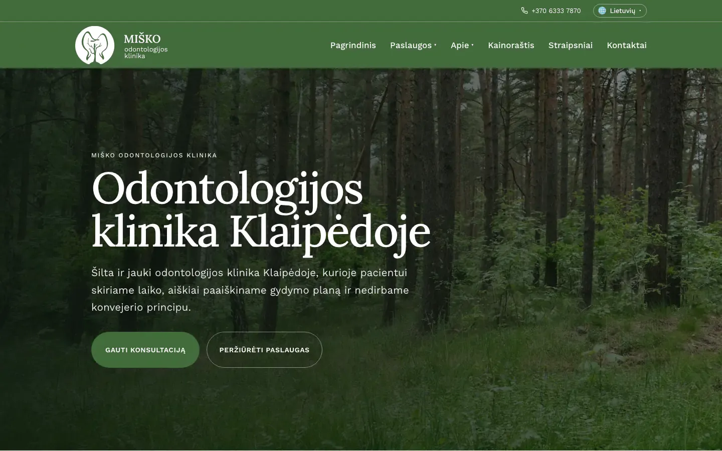 Miško Klinika homepage with a forest photo and the heading Odontologijos klinika Klaipėdoje (dental clinic in Klaipėda)