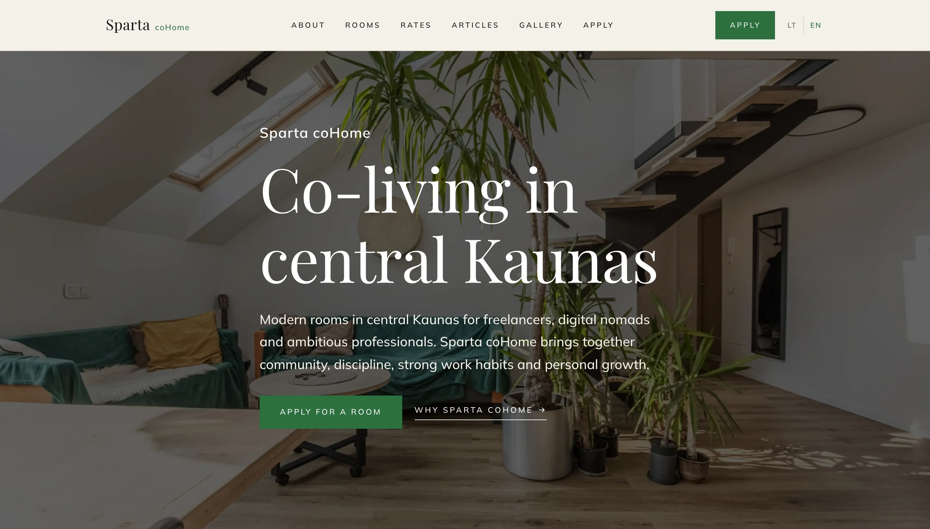 Sparta coHome English homepage with the heading Co-living in central Kaunas over a bright loft living room, an Apply for a room button and the LT and EN language switch